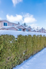 A typical american house in winter. Snow covered.