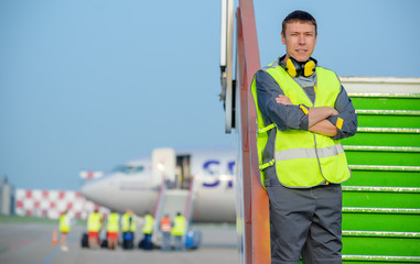 airport worker radio coordinate control ladder terminal