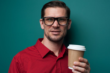 Portrait of smiling handsome young man in glasses