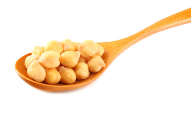 chickpeas in wooden spoon isolated on white background
