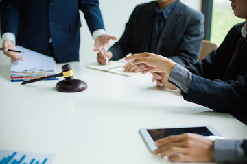 Group of business people and lawyers discussing contract papers ,Consultation between a male lawyer and businessman concept