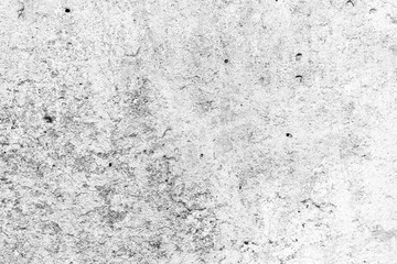 Texture of a concrete wall with cracks and scratches which can be used as a background