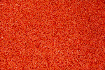 Background of red carpet or foot scraper