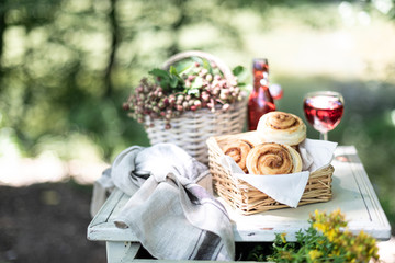 Breakfast in the garden: buns, juice from fresh strawberries