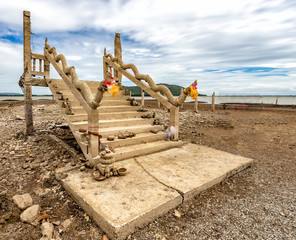ruins temple under the water appeared after the water reduced in critical drought at Pa Sak Jolasid dam   Lopburi province Thailand.