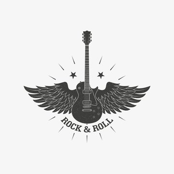 Guitar with wings and stars with rays with a grunge texture. Illustration on the theme of rock music.