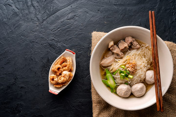 Thai style noodles on dark table background , Thai food concept