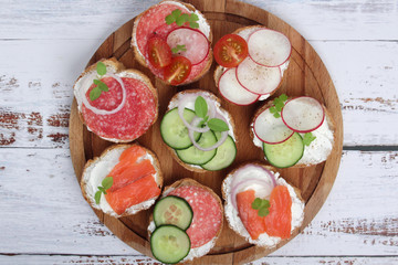 Top view on different sandwiches, flat lay