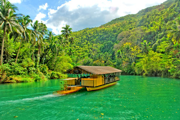 The Loboc River  -  a river in the Bohol province of the Philippines. - obrazy, fototapety, plakaty