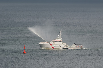 SAFETY AT SEA - Search And Rescue boat in action at sea