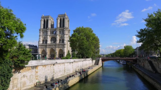 Forward Slow Time-Lapse: Breathtaking Structures of Notre Dam Explored by Tourists of Paris