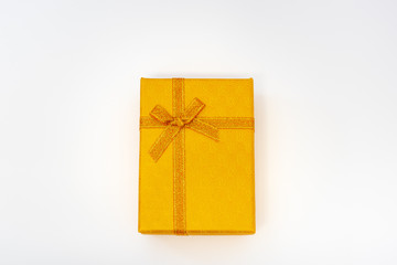 gift wrapping box with gold ribbon, top view