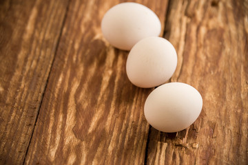 Fresh delicious fruit eggs for a good meal..Wood background.