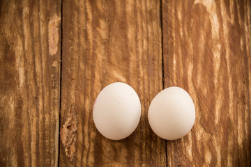 Fresh delicious fruit eggs for a good meal..Wood background.