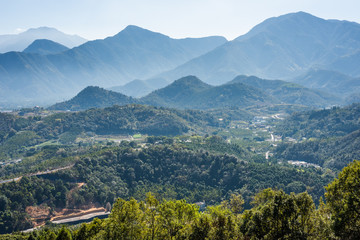 Fototapeta na wymiar landscape of small town with mountain