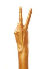 Hands in gold paint. Golden fingers. Female hand is showing numbers isolated on white background. Sign language. Hand numbers