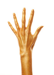 Hands in gold paint. Golden fingers. Female hand is showing numbers isolated on white background. Sign language. Hand numbers