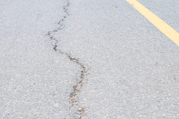 asphalt road cracked. street highway countryside