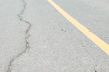Fototapeta premium asphalt road cracked. street highway countryside
