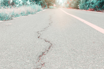 asphalt road cracked. street highway countryside