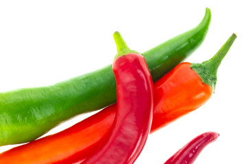 set of green orange red close-up on a white background bright vegetables