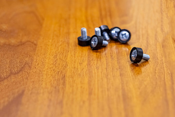 set metal bolts plastic washers repair computer server on wooden table copy space