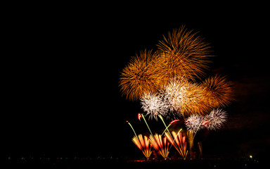 Landscape of Chiba city fireworks event in the background of Tokyo city light in the summer night