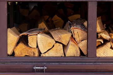 stack chipped log fuel fireplace cozy warmly in winter evening firewood storage