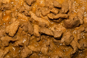 mini pork slices cooked seasoned sauce background base cooking