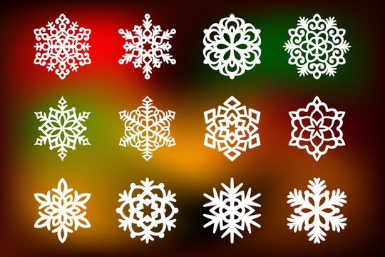 Christmas set with a snowflakes cut out of paper. Templates for laser cutting, plotter cutting or printing. Festive background.