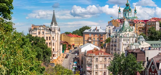 Foto auf Acrylglas Andrew descent, Andriyivski uzviz with ancient buildings and famous St. Andrew or Andriivska Church, historical district of Kyiv city in Ukraine © O.Farion