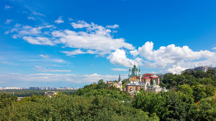 Famous St. Andrew or Andriivska Church on Andriyivsky descent, panorama of Kyiv city in Ukraine