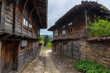 Fototapeta na wymiar Revival traditional bulgarian houses of the nineteenth century in historical old town of Kotel, Sliven Region, Bulgaria. Heritage monument of culture in spring time