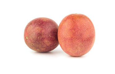 two passion fruit on white