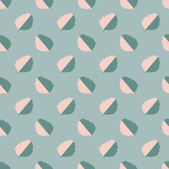 Vector seamless pattern with green and grey autumn leaves on a blue background.