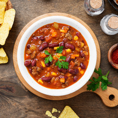 Traditional mexican dish chili con carne with minced meat and red beans. 