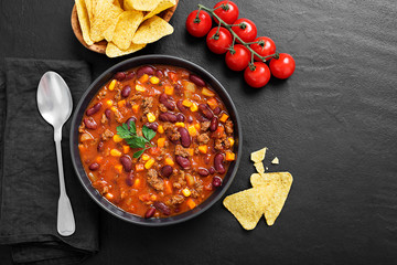 Traditional mexican dish chili con carne with minced meat and red beans. 