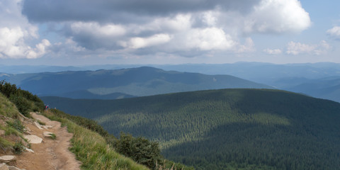 Fototapeta na wymiar Panoramic view on way to Hoverla, Carpathian mountains, Ukraine. Horizontal outdoors shot
