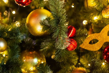 Obraz na płótnie Canvas decor festive golden christmas design toy christmas carnival mask fluffy spruce background