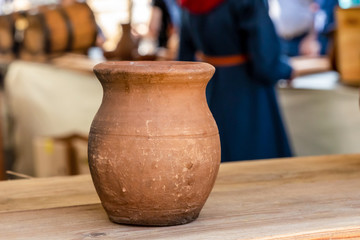 Fototapeta na wymiar brown clay pot traditional vessel storage milk oil natural material