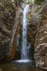 Fototapeta na wymiar Millomeris Waterfalls near Platres in Cyprus. Long exposure