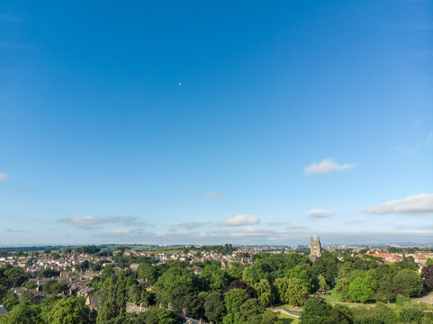 Aerial photo of the Leeds town of Pudsey in West Yorkshire, England showing typical British streets and business taken on a sunny bright summers day.