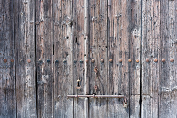 Old wooden gates with iron handles,Wooden gates