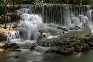 Fototapeta na wymiar Waterfall that is a layer in Thailand