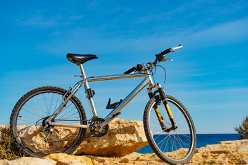 Bicycle on beach, active lifestyle.