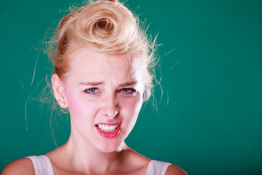 Astonishment young woman with pin up hair