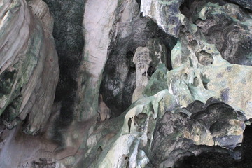 cave in a rock with stone walls