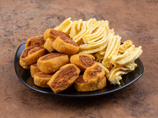 Indian Traditional Spicy Snack Ghatiya With Bhakarwadi Also Know as Ganthiya, Papdi, Gathiya, Bakarwadi, Bakarvadi, Bakar Vadi or Bakar Wadi Are Deep Fried Snack Made From Chickpea Flour.