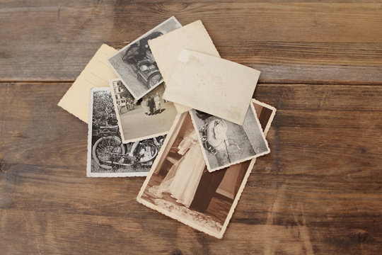 retro some old photos on wooden table