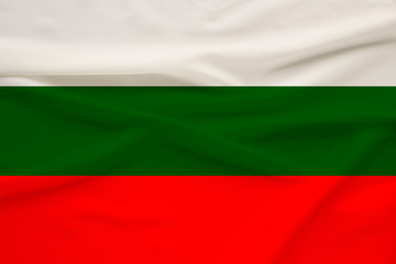 national flag of Bulgaria on delicate silk with wind folds, travel concept, immigration, politics